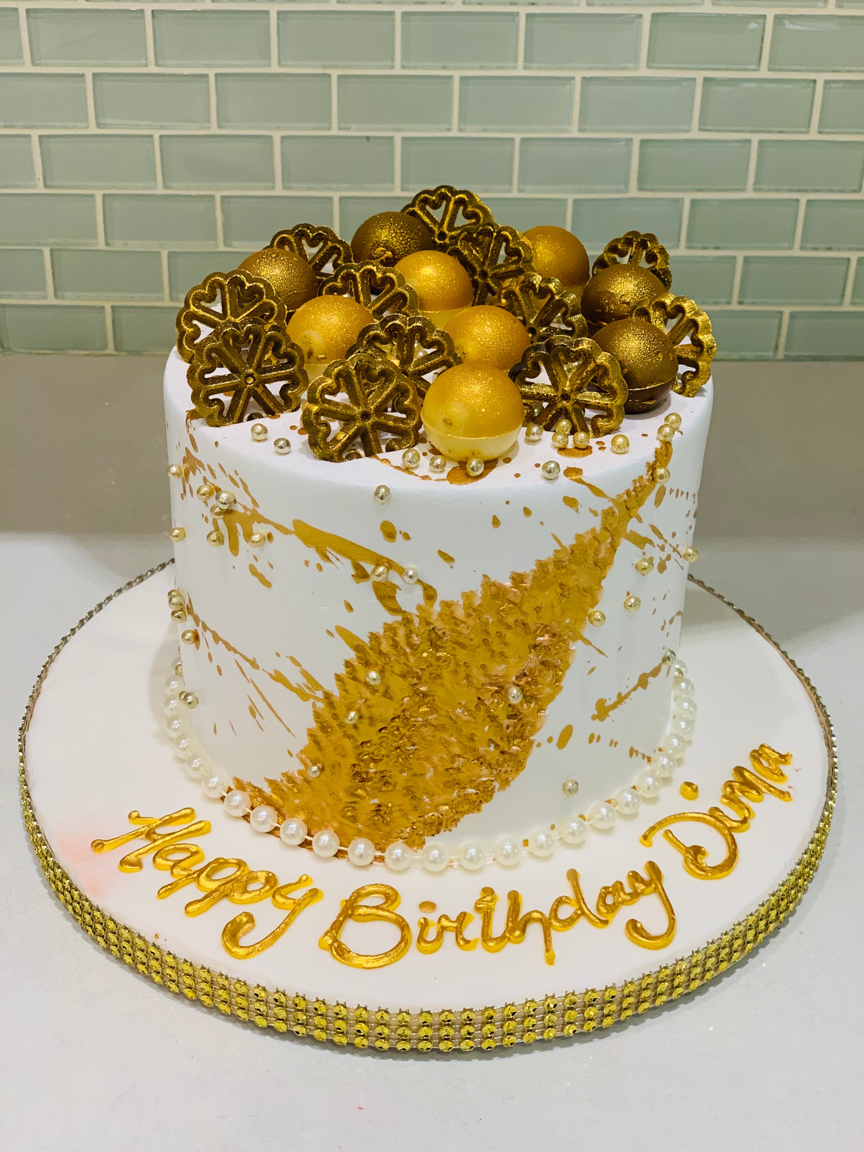 Ron Ben-Israel Makes A 24-Karat Gold-Covered Black Wedding Cake