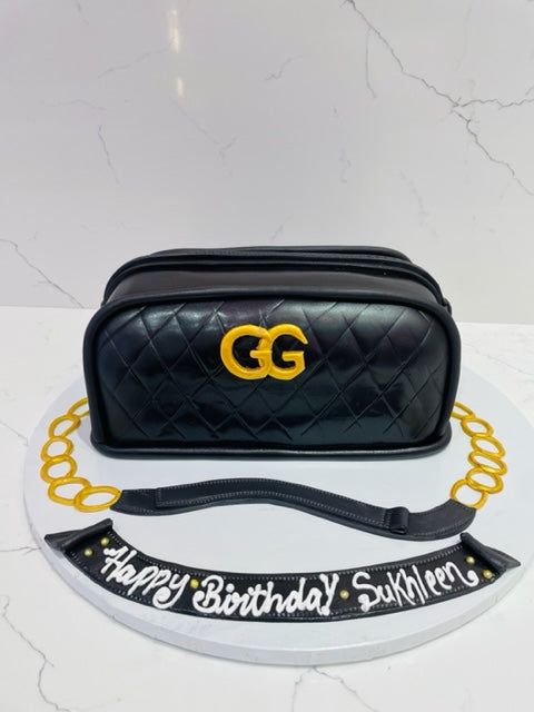 Gucci cake with matching belt and wallet. Made with Cake Couture fondant.