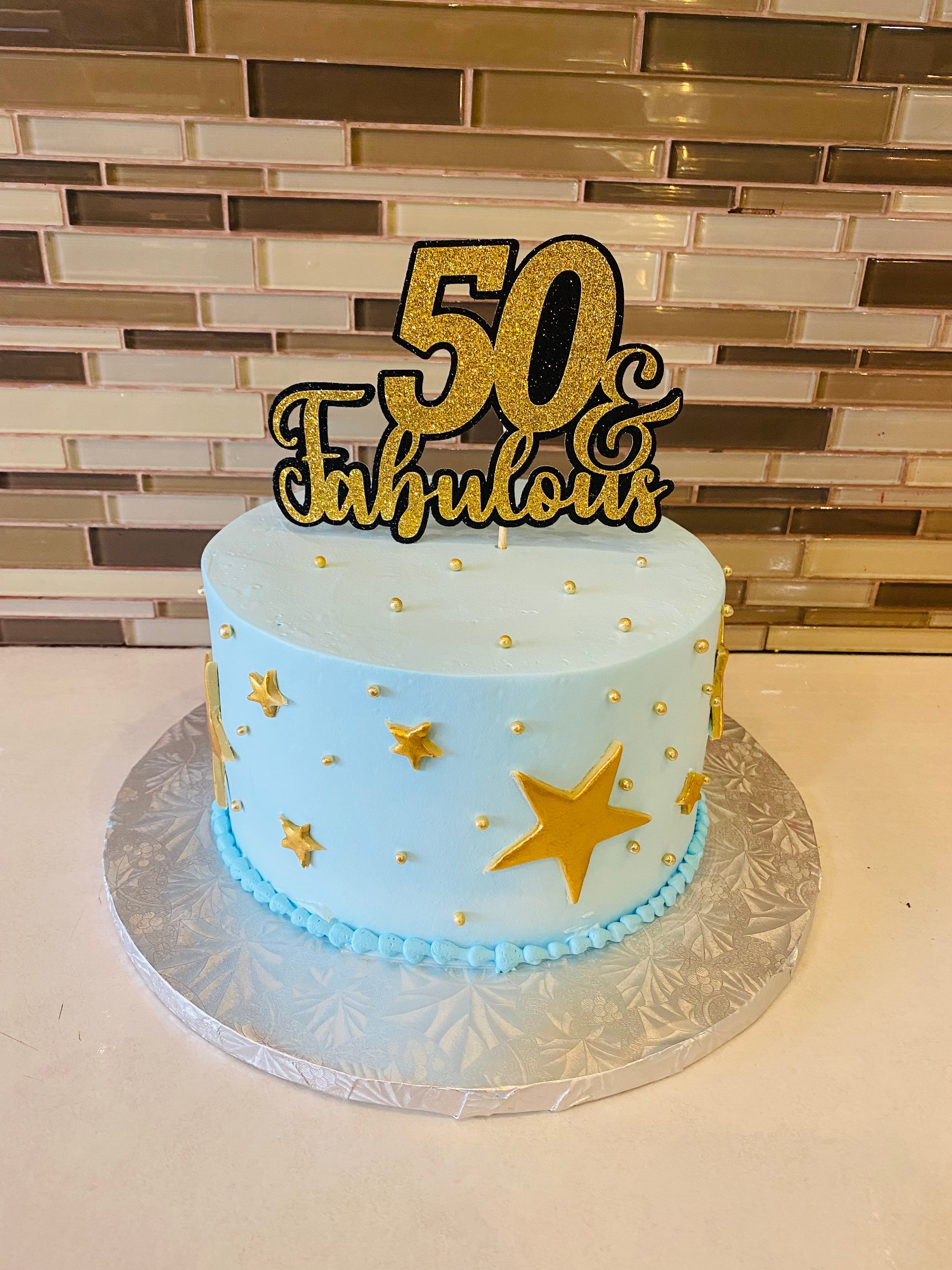 Photo of a gold white 50th anniversary cake - Patty's Cakes and Desserts